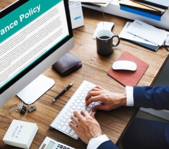 For an online business (entrepreneur checking insurance conditions, important research, office)